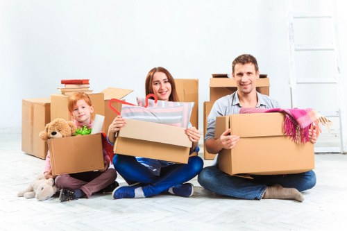 Loading household items into a removal van