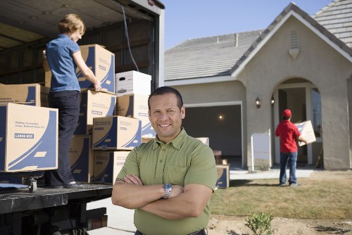 Moving checklist and packed boxes ready for collection
