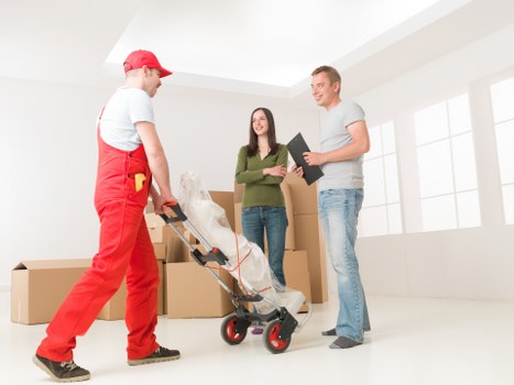 Packed boxes and furniture arranged in a moving truck