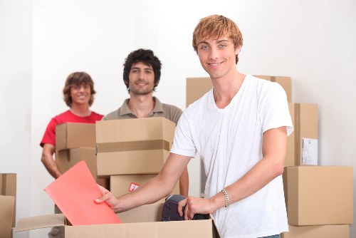 Removalists handling household items for a local West Hampstead relocation